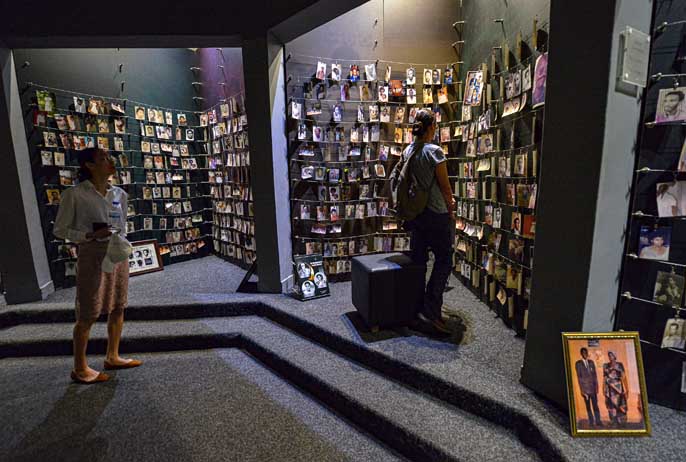 KIGALI, RWANDA - SEPTEMBER 2019: Tourists visiting the National Memorial to the victims of Genocide on September 25, 2019 in Kigali, Rwanda.
