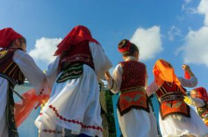 View of colorful traditional costumes of girls in Tirana, Albania on May